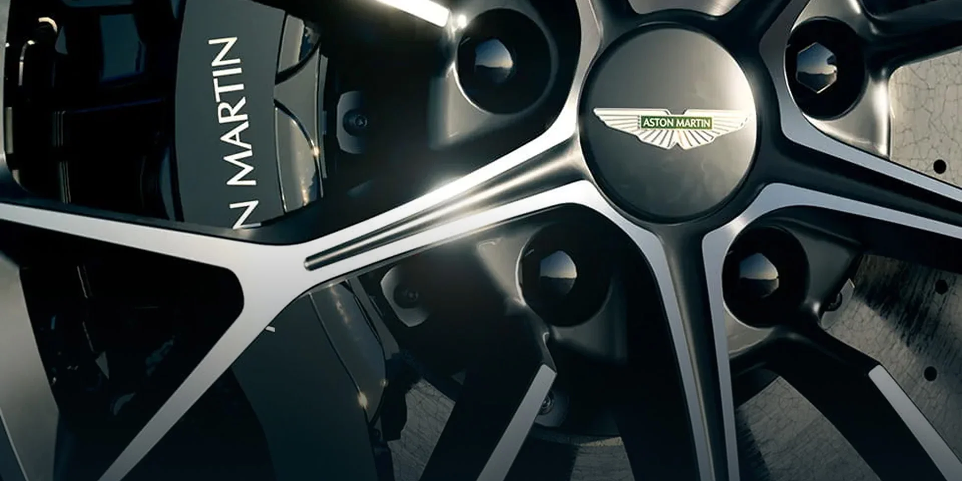 The wheel of a 2026 Aston Martin vehicle, complete with brand logo